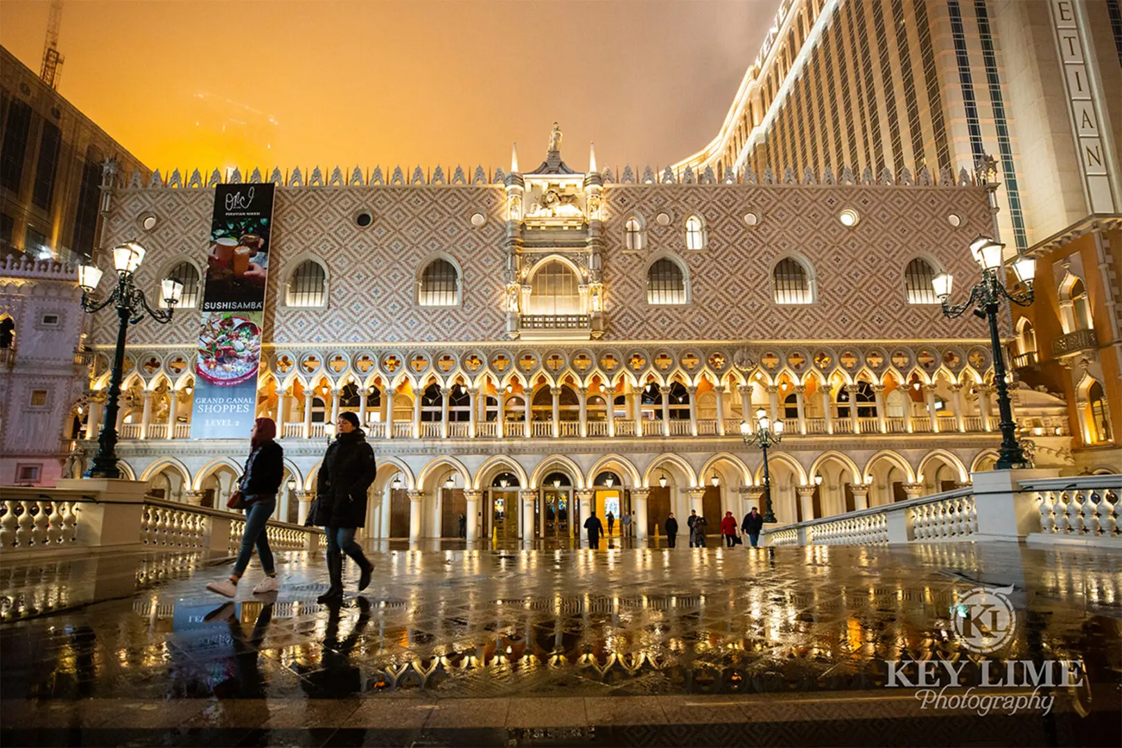 Architecture photographer image of colonnade. Rainy reflective bridge walkway