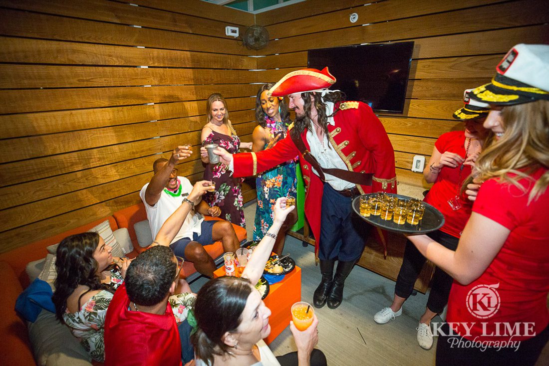 Private cabana at the rooftop party at Plaza Hotel and Casino. Photo by Key Lime Photography. Captain Morgan proposing a toast