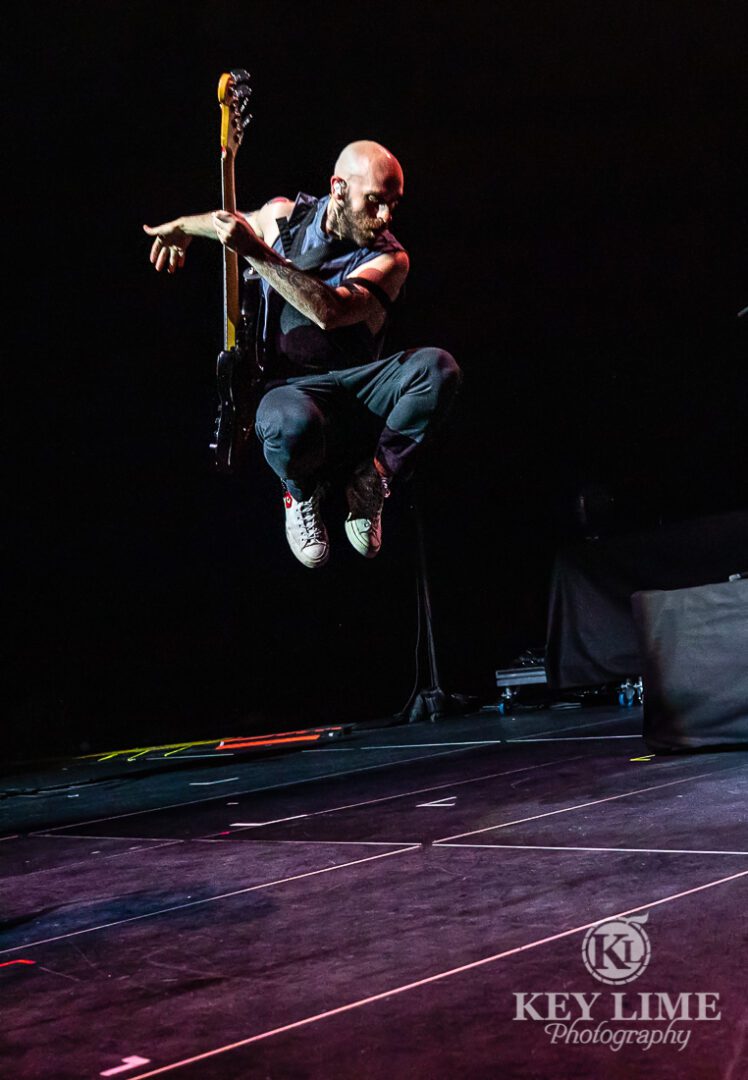 X Ambassadors front man catching air during a show in Las Vegas. OBC photo by Key Lime Photography