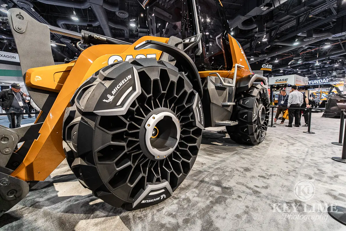 Construction photography of Case Construction's unveiled concept Tetra, the first bio-methane equipment. ConExpo 2020 photo of heavy equipment that looks like a sports car.