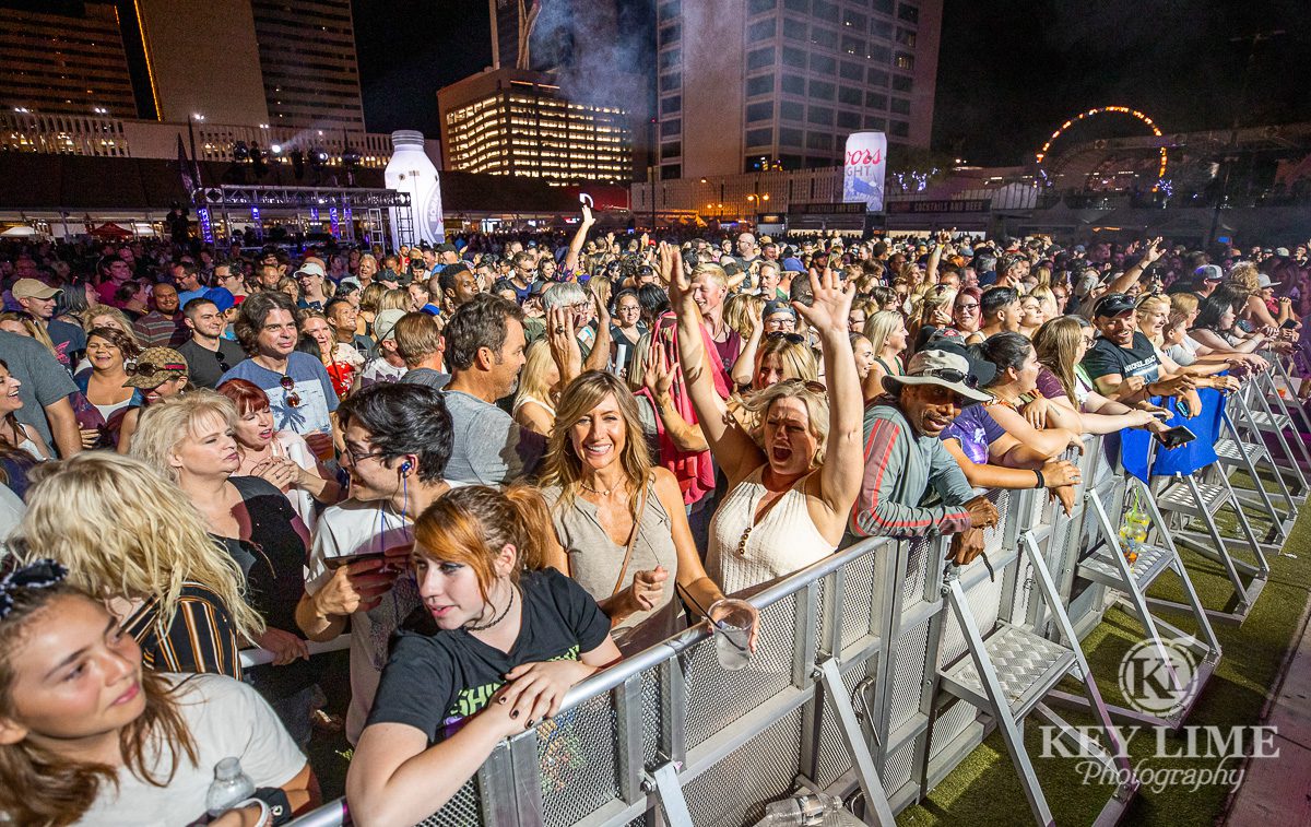 Concert crowd excited face over the announcement of Santana's arrival. Event photography of Bite of Las Vegas 2019