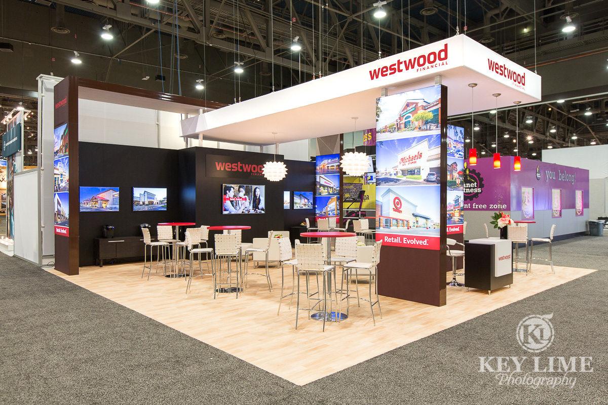 trade show photgrapher image of red and white booth design